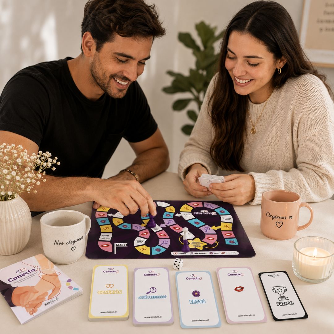 Pareja jugando Conecta2, juego de mesa para parejas